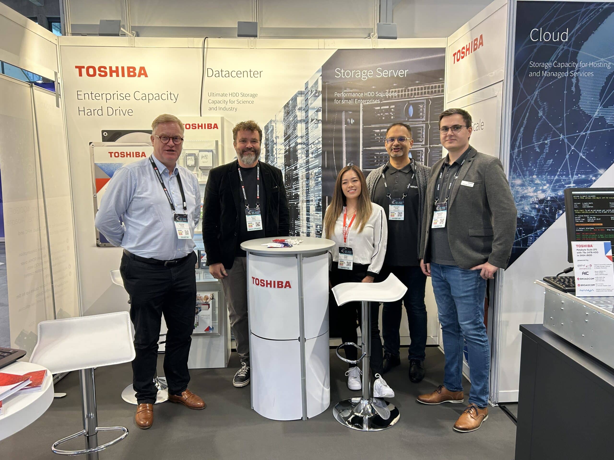 Team Toshiba and partners standing at booth
